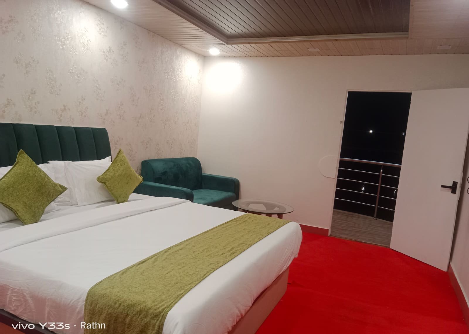 A boat house bedroom looking out towards its balcony