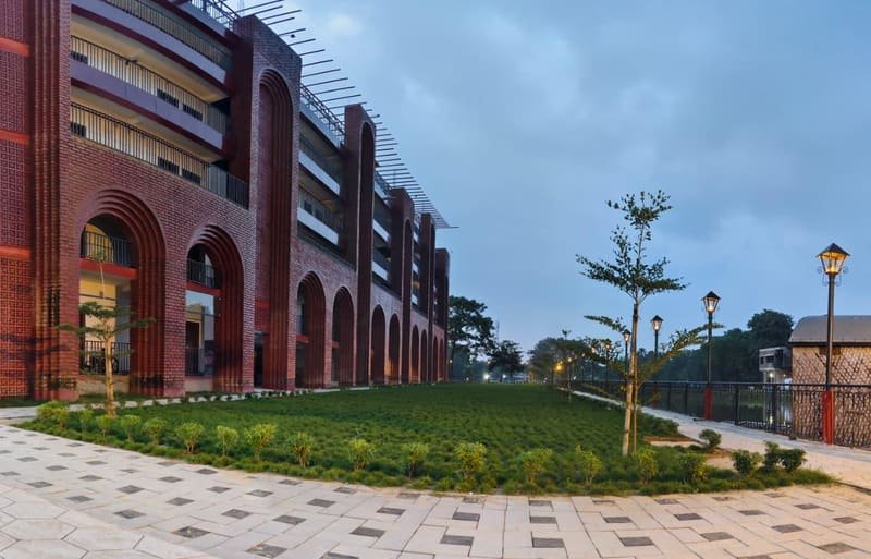 The upper floors of the resort under an evening sky